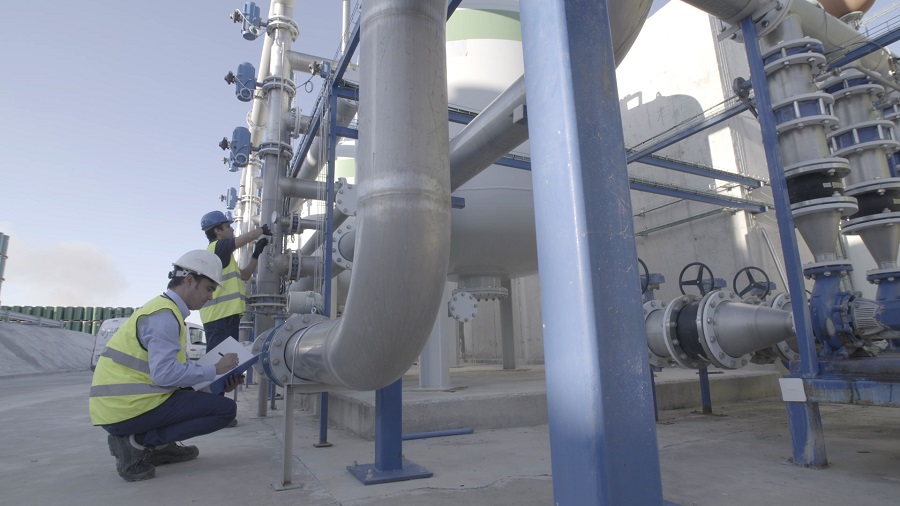 J. Huesa technician performing on-site maintenance